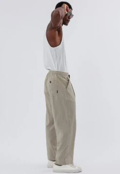 MONACO PLEATED HOLIDAY TROUSERS SHELL 15 MONACO PLEATED HOLIDAY TROUSERS SHELL -Religion Clothing 15HPAP65PLEATEDJOGGERSHELL 22